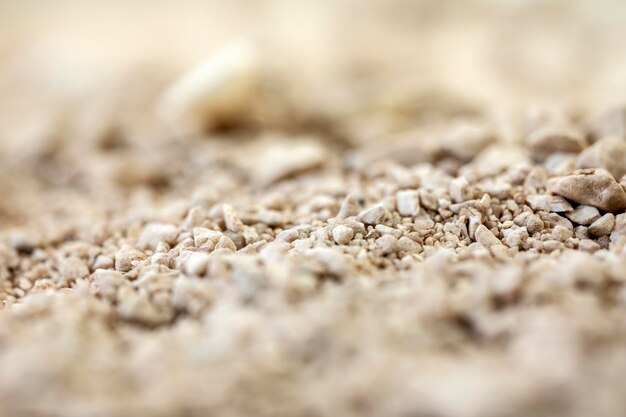 Details of sandstone texture background seamless sand selective focus macro close up soft colors