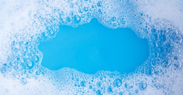 Detergent foam bubble blue background