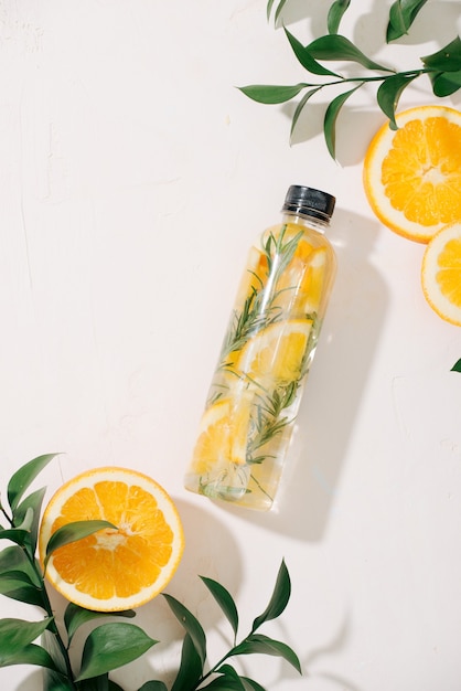 Detox fruit infused flavored water. Refreshing summer homemade cocktail