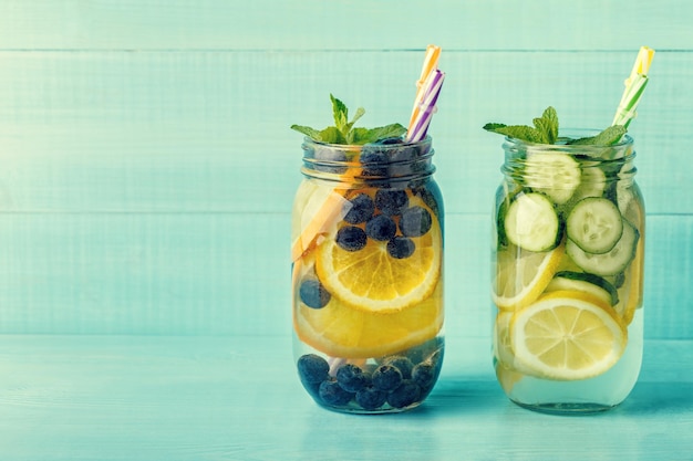 Detox fruit infused water Refreshing summer homemade cocktail selective focus