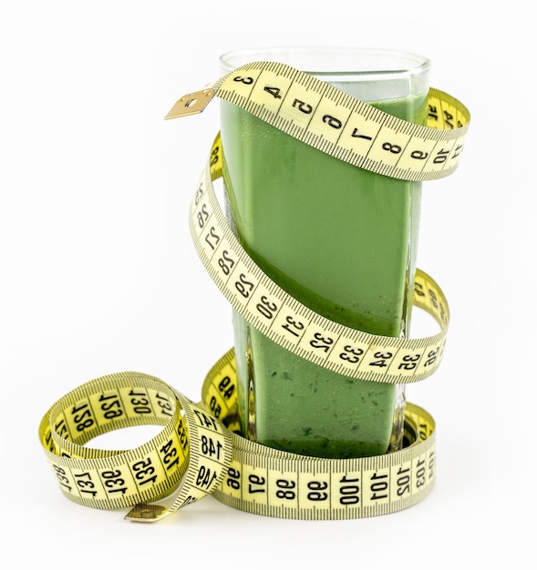 Detox juice and tape measure