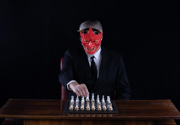 the devil plays chess, black studio background