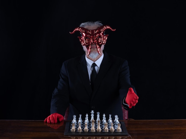 the devil plays chess, black studio background