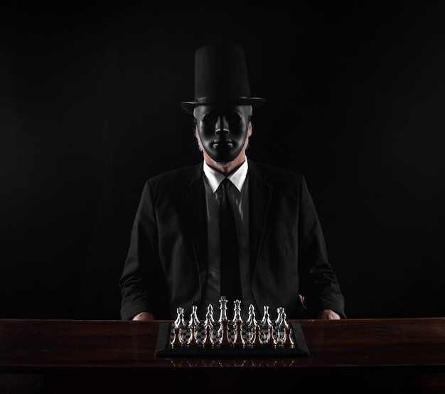 the devil plays chess, black studio background