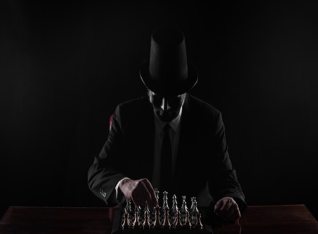 the devil plays chess, black studio background