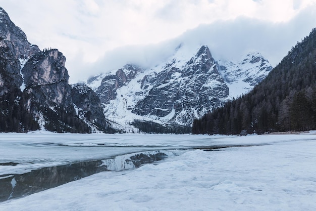 Di Braies lake during the winter in the middle of Alps mountains