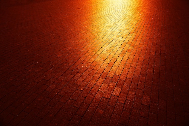 Diagonal street pavement texture during sunset