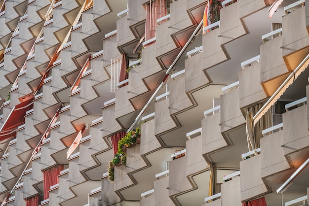 Diagonal view of rows of balconies of a residential building