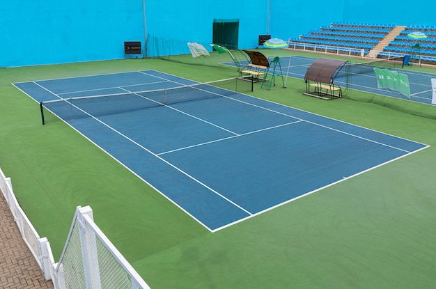 Diagonal view of tennis court in tennis training centre.