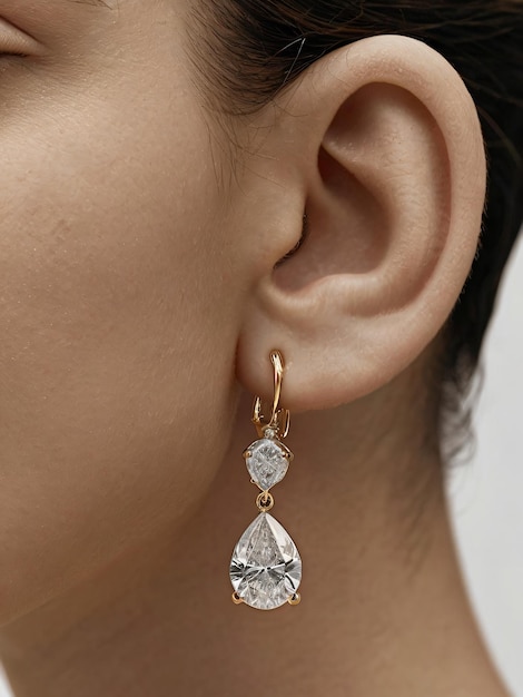 a diamond earring is worn by a woman