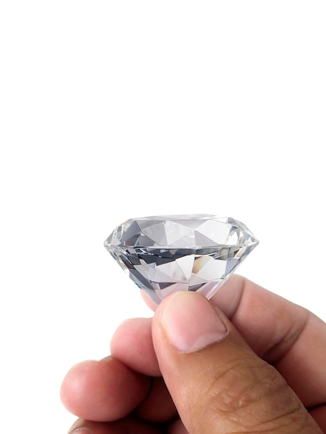 Photo diamond jewel in hand isolated on white background