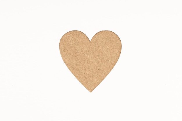 Photo diecut cardboard heart shaped isolated on white paper background love concept