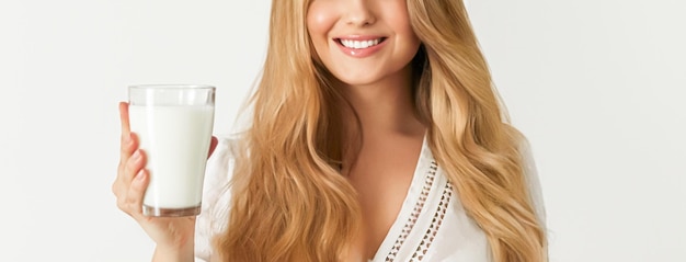 Diet health and wellness woman holding glass of milk or protein shake cocktail