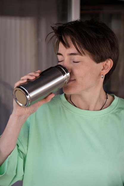 Diet healthy eating and rest woman drinks clean water in glass