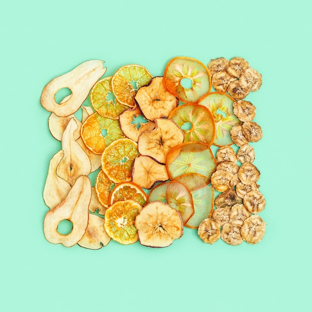 Diet Healthy snack, set of dried fruits, dehydrated fruit chips of apple, banana, persimmon, tangerine, pear.