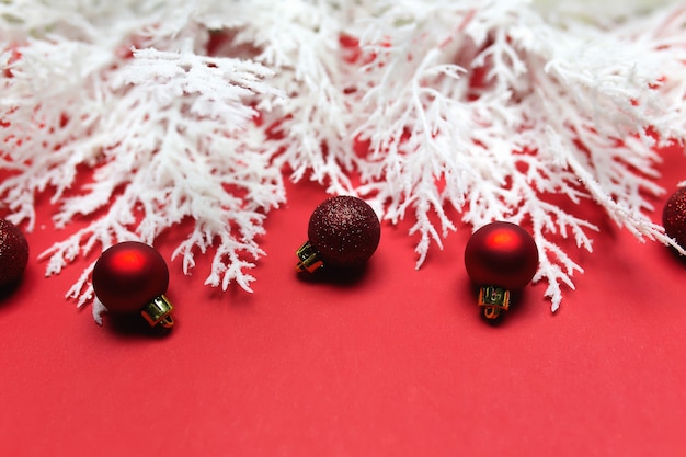 Different Christmas decorations on red.