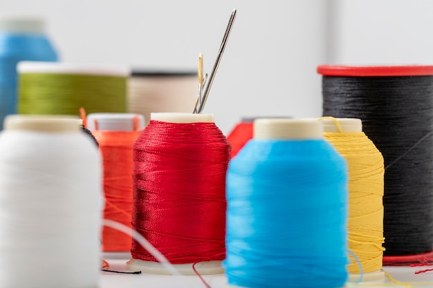 Different colored yarn on white background Close up Selective Focus