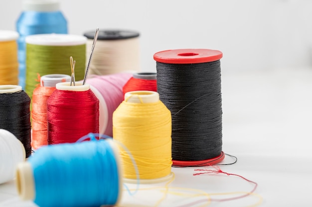 Different colored yarn on white background Close up Selective Focus