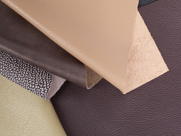 Different colors natural leather textures samples. Close-up shot