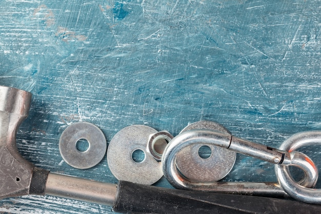 different construction tools on blue background