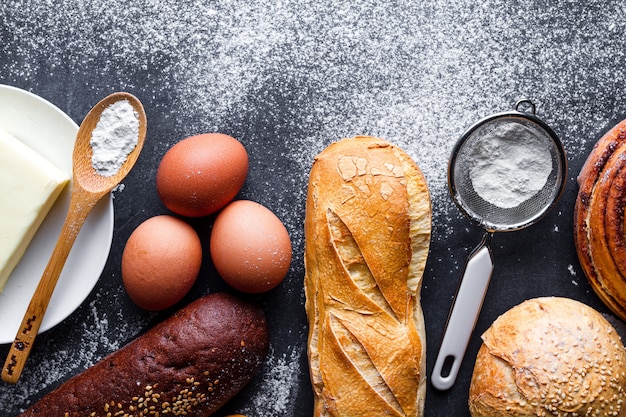 Different fresh, crisp bakery products and baking ingredients