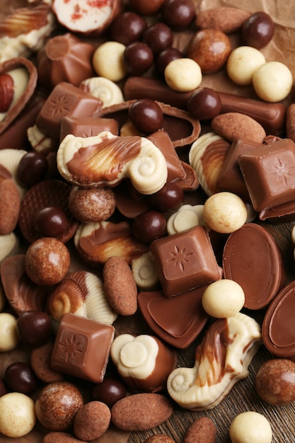 Different kinds of chocolates close-up background