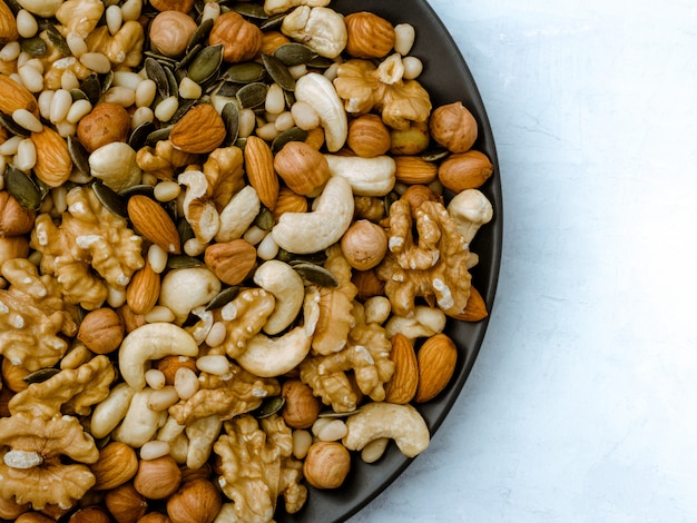 Different kinds of nuts. Cashew, hazelnut, almond, walnut,  cedar.