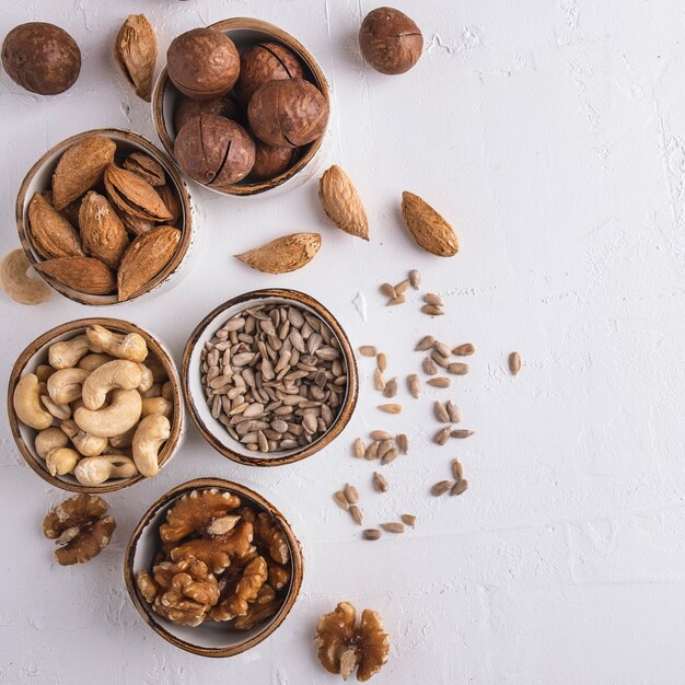 Different nuts in a bowl. Top view.