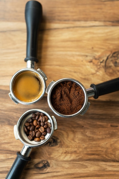 Different processes of preparing coffee by a barista in a coffee shop Coffee beans ground ready Coffee art concept Top view place for an inscription