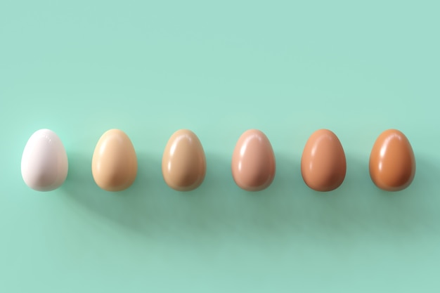 Different shades of eggs on green background. Minimal Easter idea.