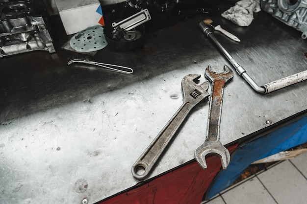 Different tools on workbench in car service