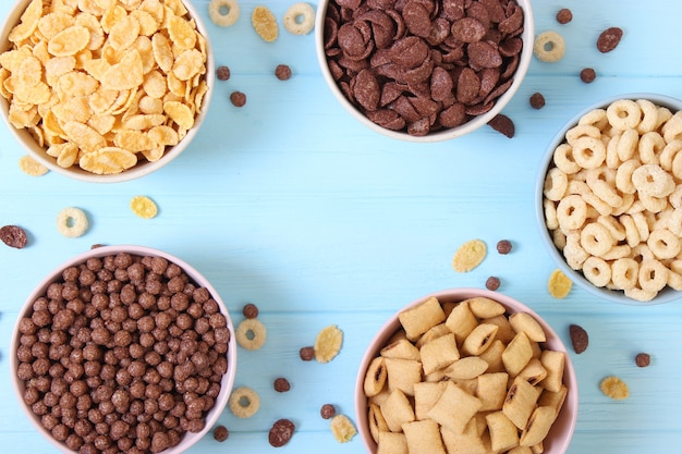 Different types of breakfast cerealson a light background closeup