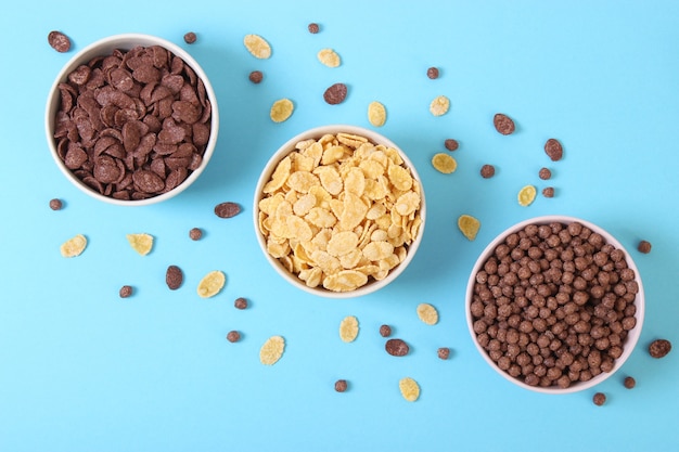 Different types of breakfast cerealson a light background closeup