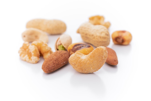 Different types of nuts on a white background