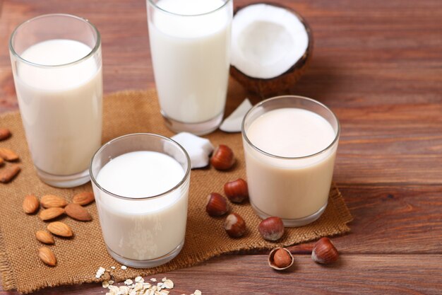 Different types of vegetable milk on the table