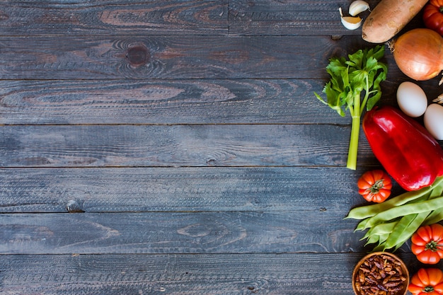 Different types of vegetables on a old wooden table