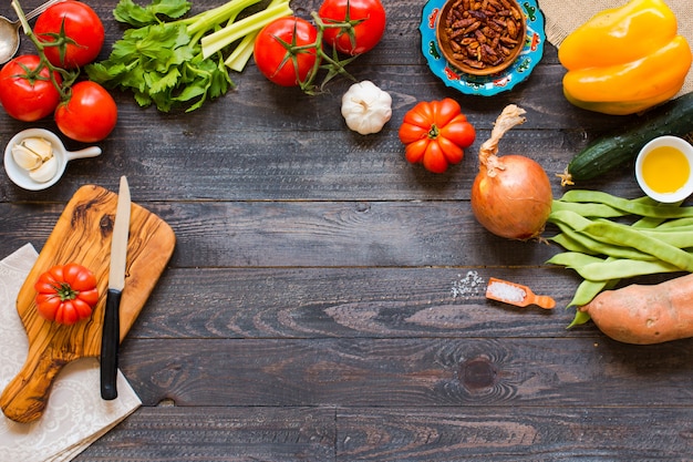 Different types of vegetables, on old wooden table