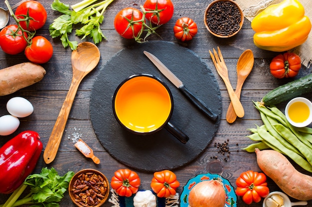 Different types of vegetables, on a old wooden table