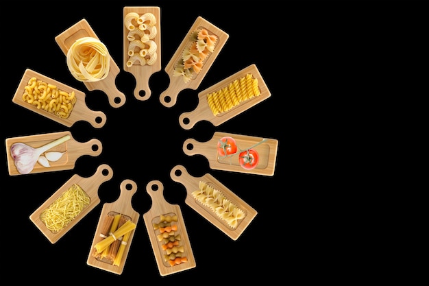 Different varieties of pasta on a cutting board. Cherry tomatoes and garlic. Isolated black background. Concept for advertising with copy space for individual text. Scale 16x9