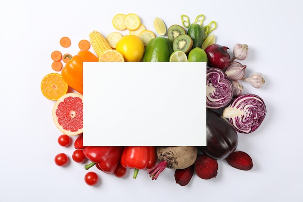 Different vegetables and fruits with empty space, top view