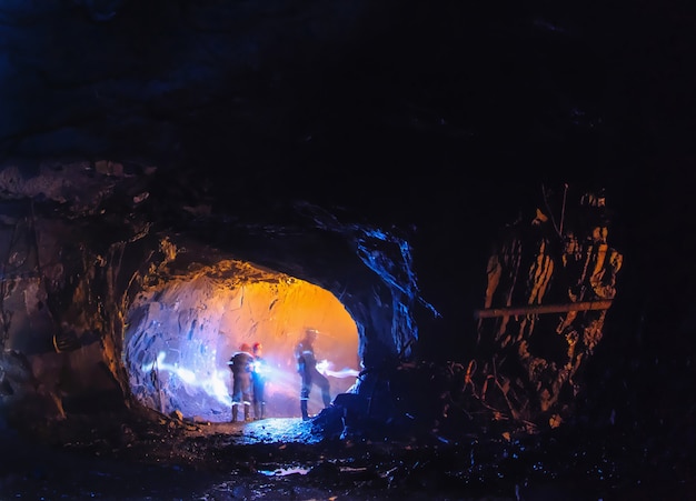 Diggers in a big cave