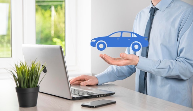 Digital composite of Man holding car icon.Car automobile insurance and car services concept. Businessman with offering gesture and icon of car.