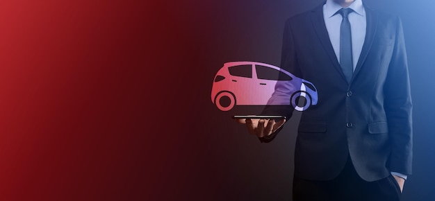 Digital composite of Man holding car iconCar automobile insurance and car services concept Businessman with offering gesture and icon of car