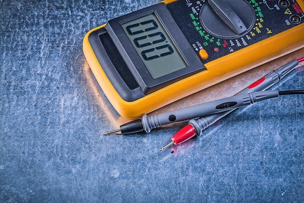 Photo digital electric tester current probe on metallic background