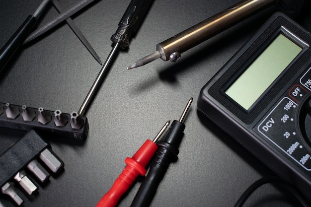 digital multimeter on black table