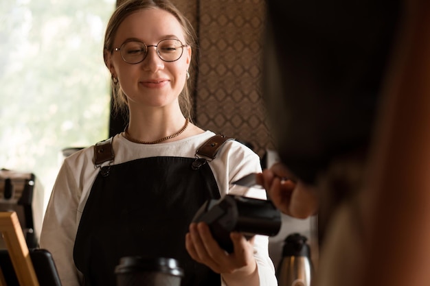 digital payment in a cafe with a bank card