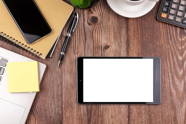 Digital tablet with empty screen on office desk