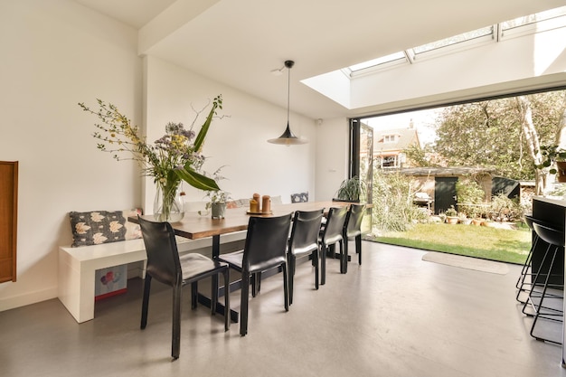 Dining table near opened balcony door