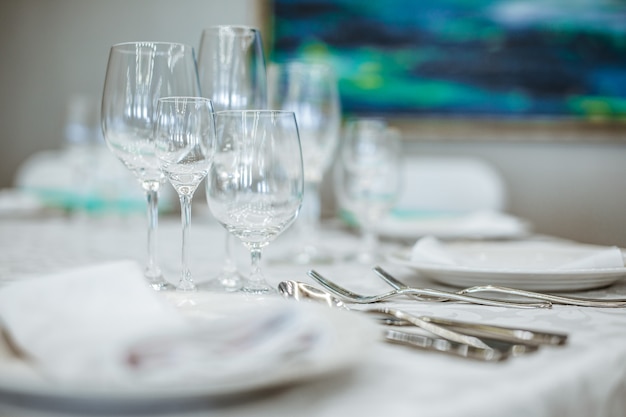 Dining table at the restaurant with empty glasses