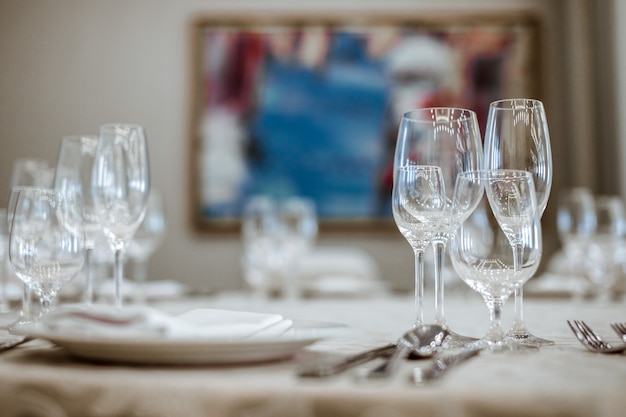 Dining table at the restaurant with empty glasses